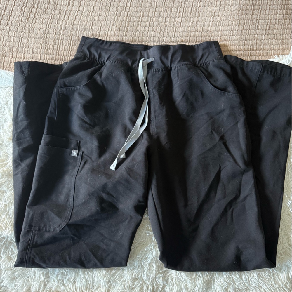 Figs scrub pants, they are either Livingston or Kade I can’t tell!